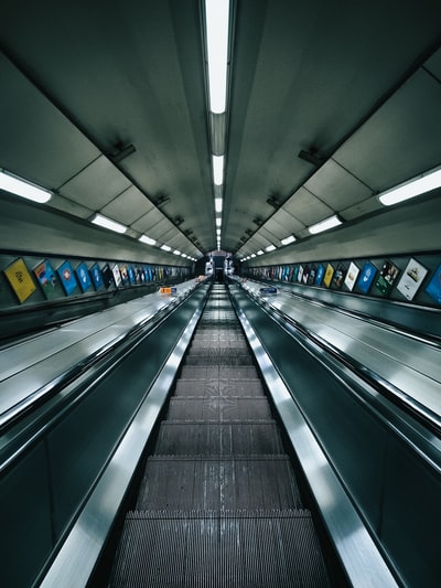 The tunnel black escalator
